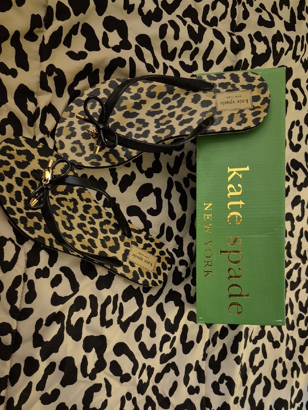 kate spade Leopard-Print Flip Sandals with Black Bow & Gold Accents